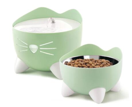 Conjunto Catit PIXI composto por fonte de água com formato felino e comedouro elevado ergonómico para gatos.